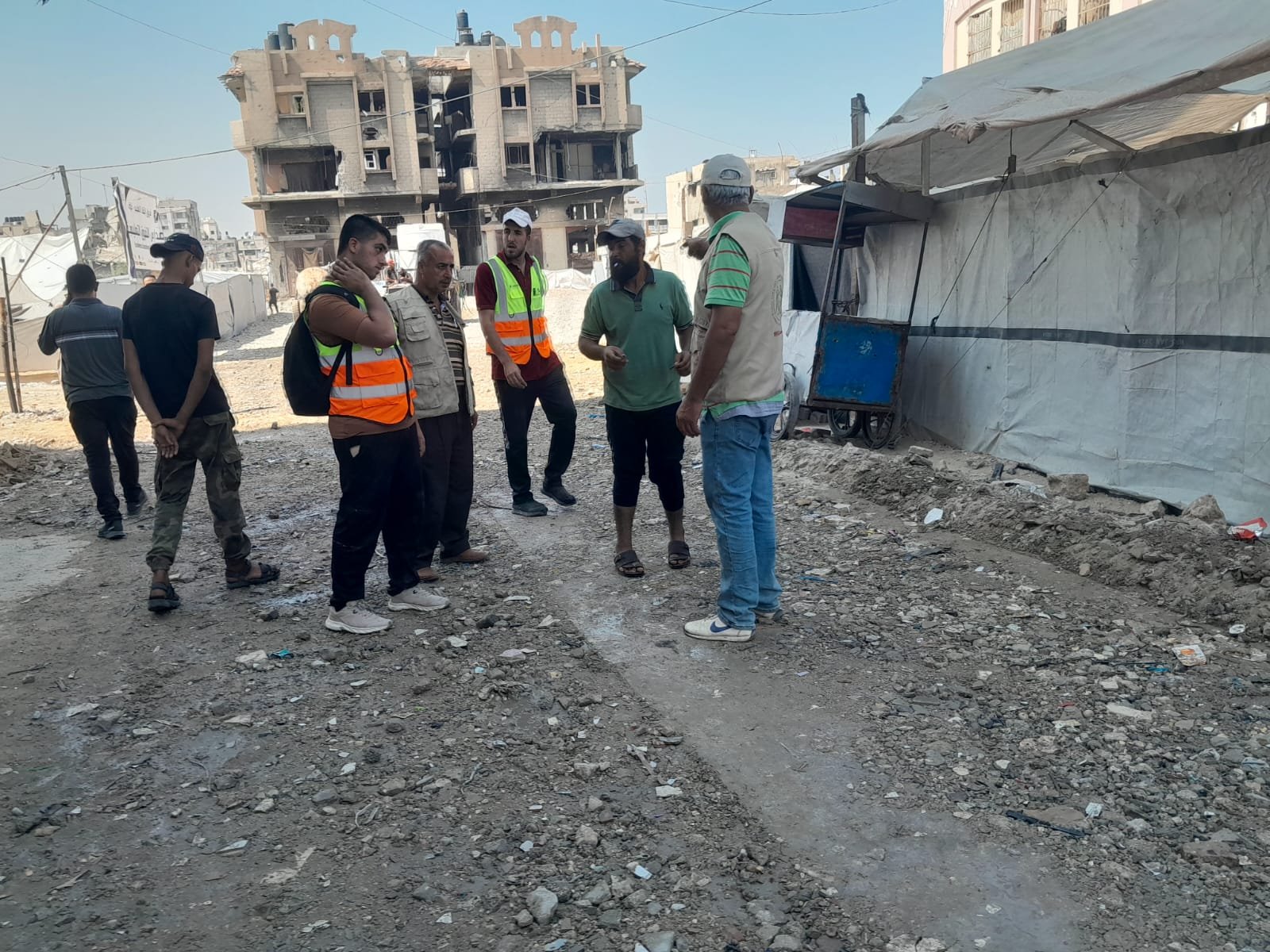 From the Ground Up: Building Al-Lababidi Clinic in Gaza Work team on the unpaved approach road outside the clinic